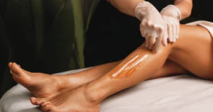 A woman receives a professional leg waxing treatment in Tracy, CA,